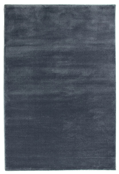 A rectangular area rug in a dark slate blue-gray color, shown from a top-down view against a white background.
