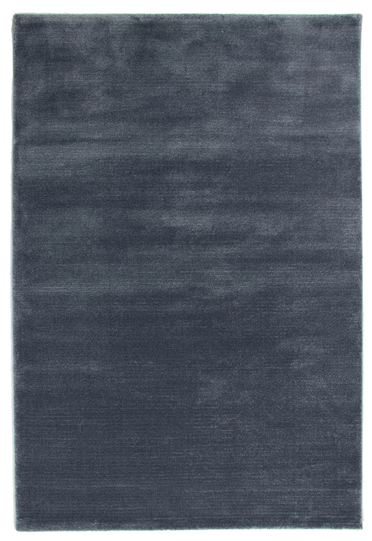 A rectangular area rug in a dark slate blue-gray color, shown from a top-down view against a white background.