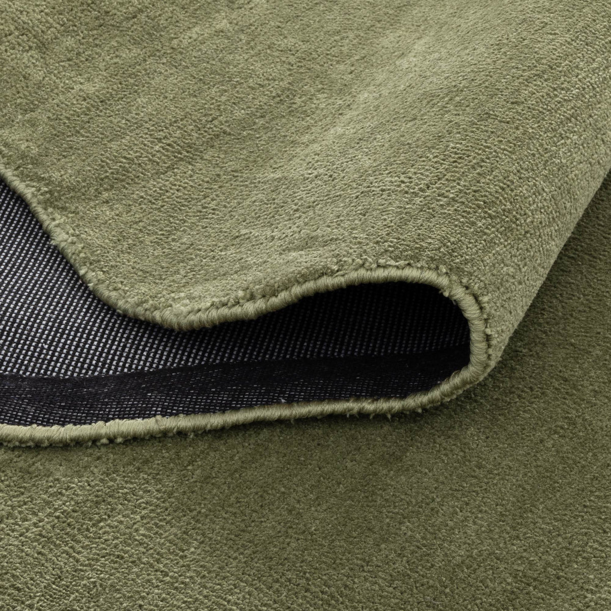 Ollie Scalloped Irregular Round Rug Green
