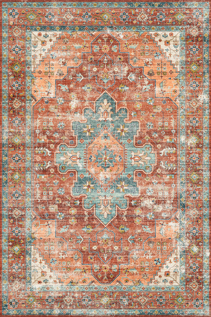 A distressed traditional area rug with a central medallion, featuring a warm terracotta and rust-orange field, a muted teal-blue center medallion, and cream-colored borders.