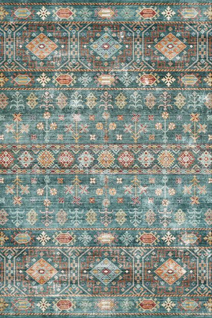 A square area rug with a distressed, vintage-style geometric pattern in muted teal, sage green, rust red, and cream.