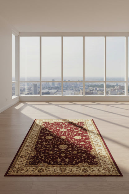 A traditional oriental-style area rug with a deep burgundy red field, ornate beige and gold floral motifs, and a wide beige border.