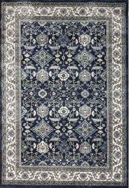 A traditional oriental-style area rug with an intricate floral and geometric pattern in navy blue, cream, and gray, shown flat from a top-down perspective.