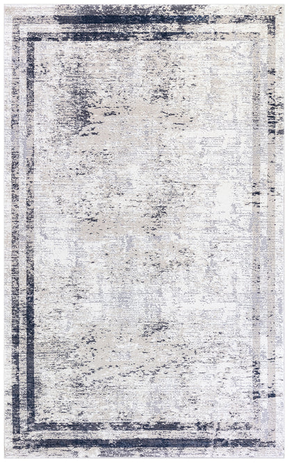 A rectangular area rug with a distressed, vintage-style pattern in off-white, beige, and navy blue, featuring a thick dark navy border.