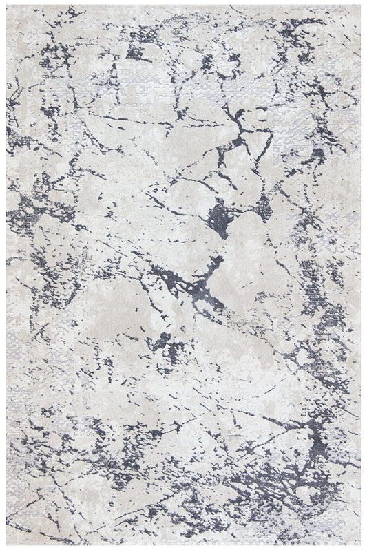 A square area rug with an abstract distressed pattern in cream, beige, and charcoal gray.