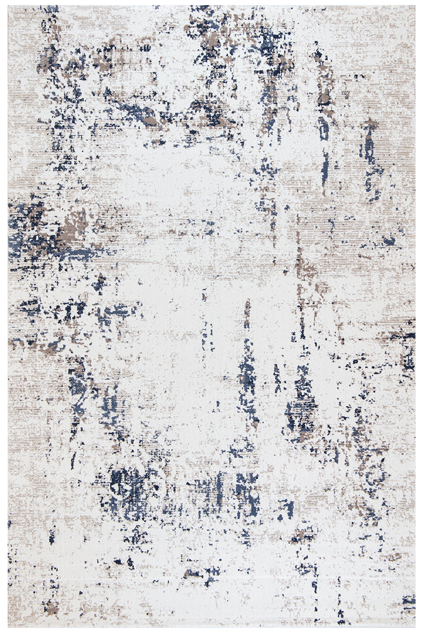 An abstract distressed area rug with a textured, vintage pattern in off-white, beige, and navy blue.